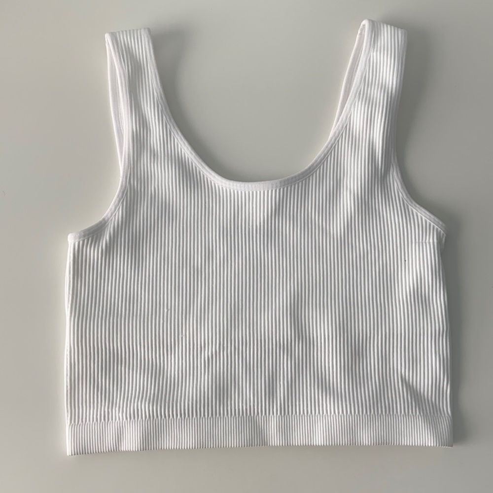 white ripped workout top